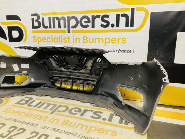 BUMPER Nissan Micra K14 + grill Logo VOORBUMPER 1-G7-11075z