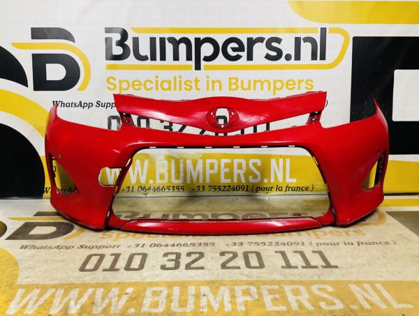 BUMPER Toyota Yaris Hybrid 2010-2014 pdc VOORBUMPER 2-D2-12076z