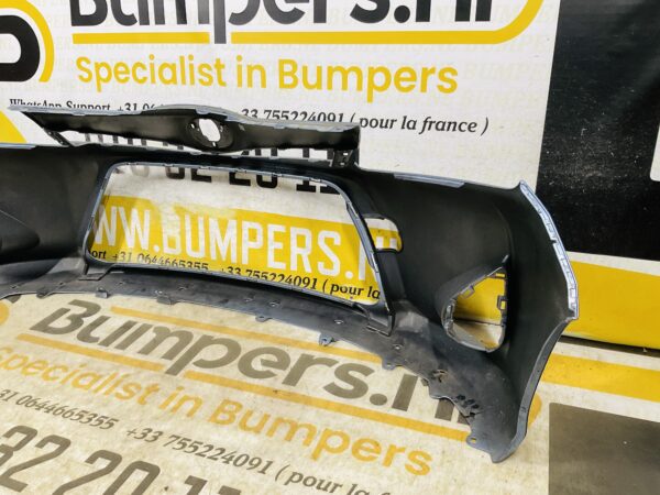 BUMPER Toyota Yaris Hybrid 2010-2014  VOORBUMPER 2-D2-12463z