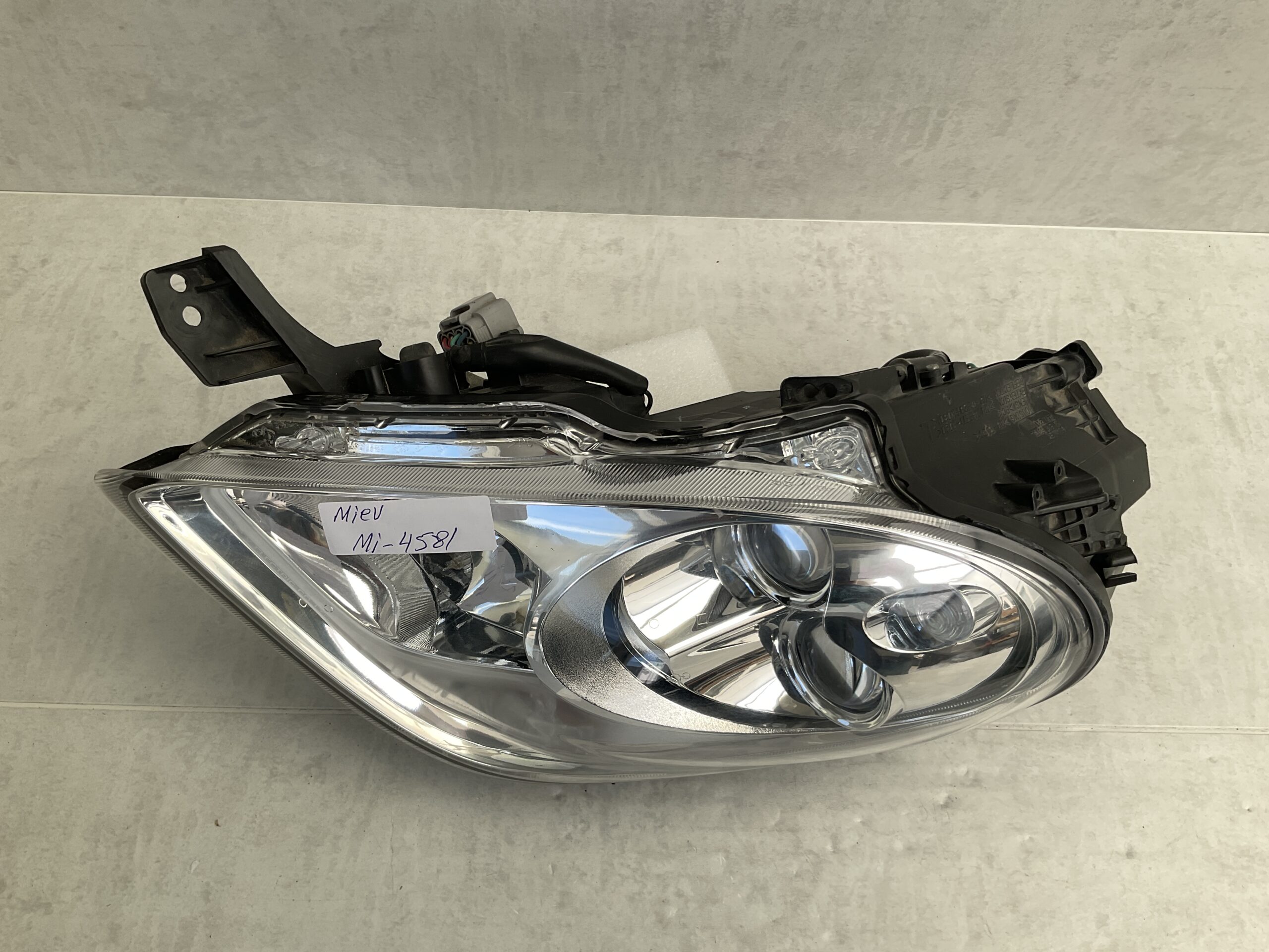 KOPLAMP MITSUBISHI MIEV ORIGINEEL LINKS MI-4581