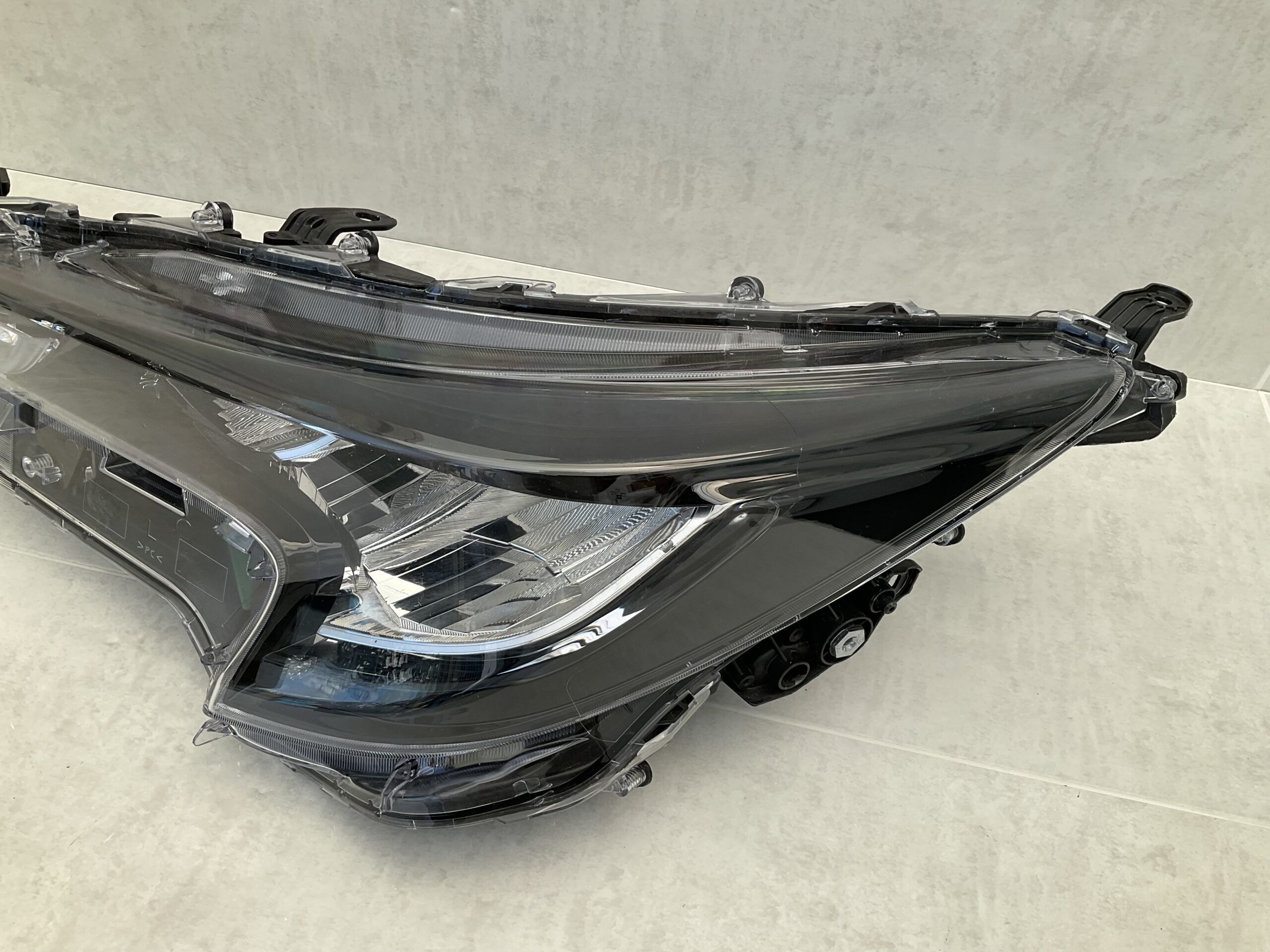 KOPLAMP TOYOTA COROLLA E21 81150-02S70 LINKS TO-4837