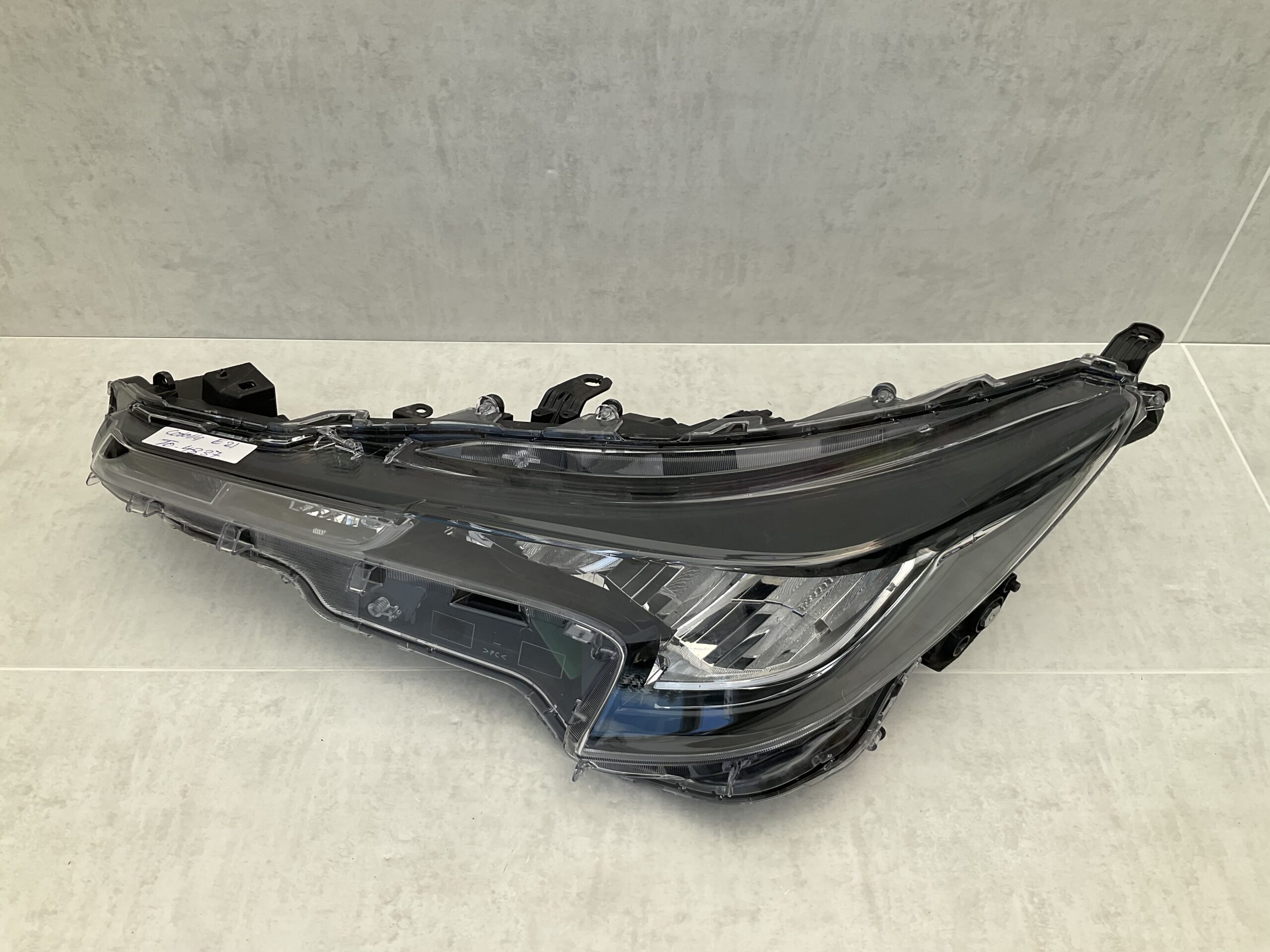 KOPLAMP TOYOTA COROLLA E21 81150-02S70 LINKS TO-4837