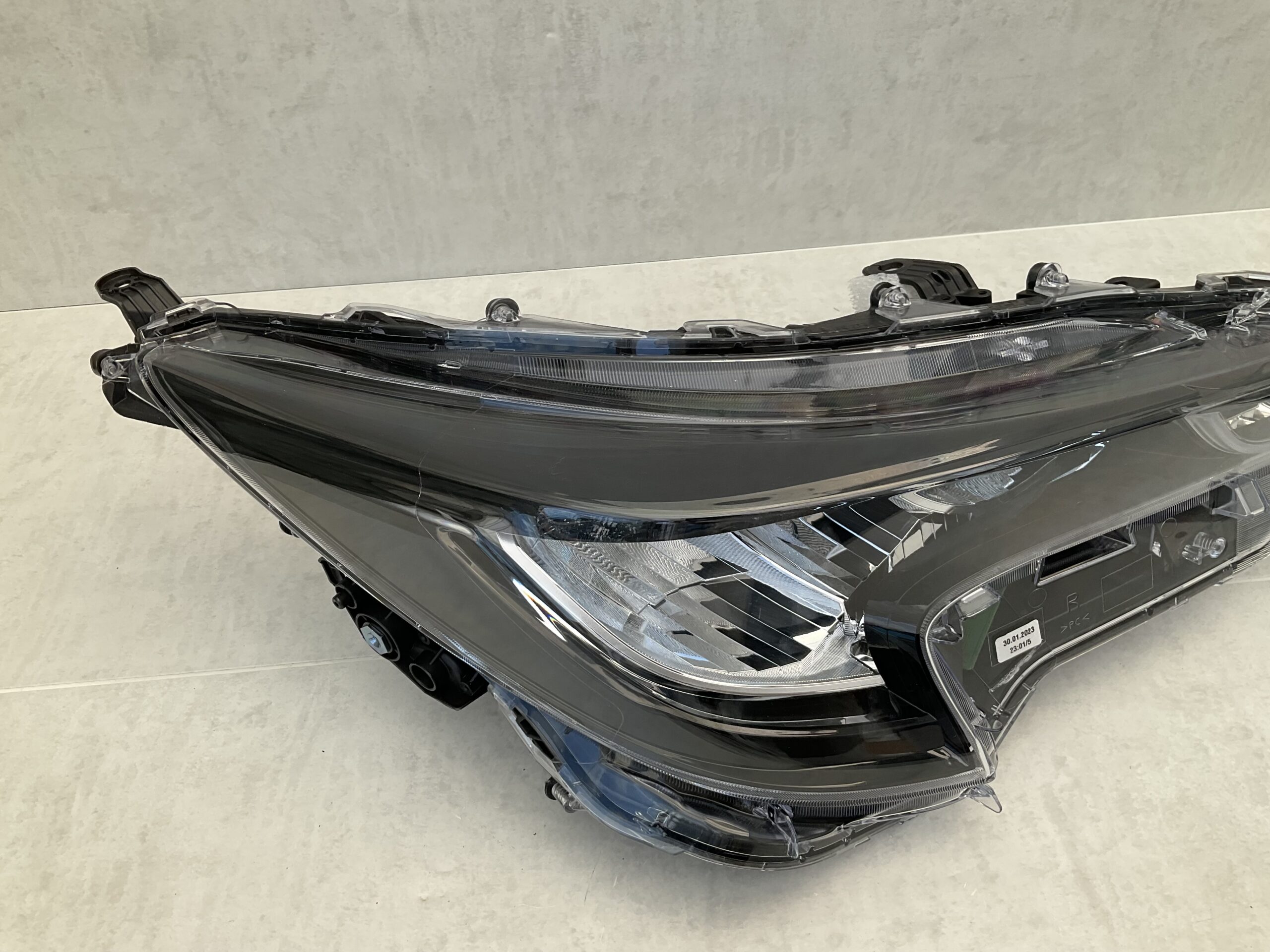 KOPLAMP TOYOTA COROLLA E21 L90119224 RECHTS TO-4827