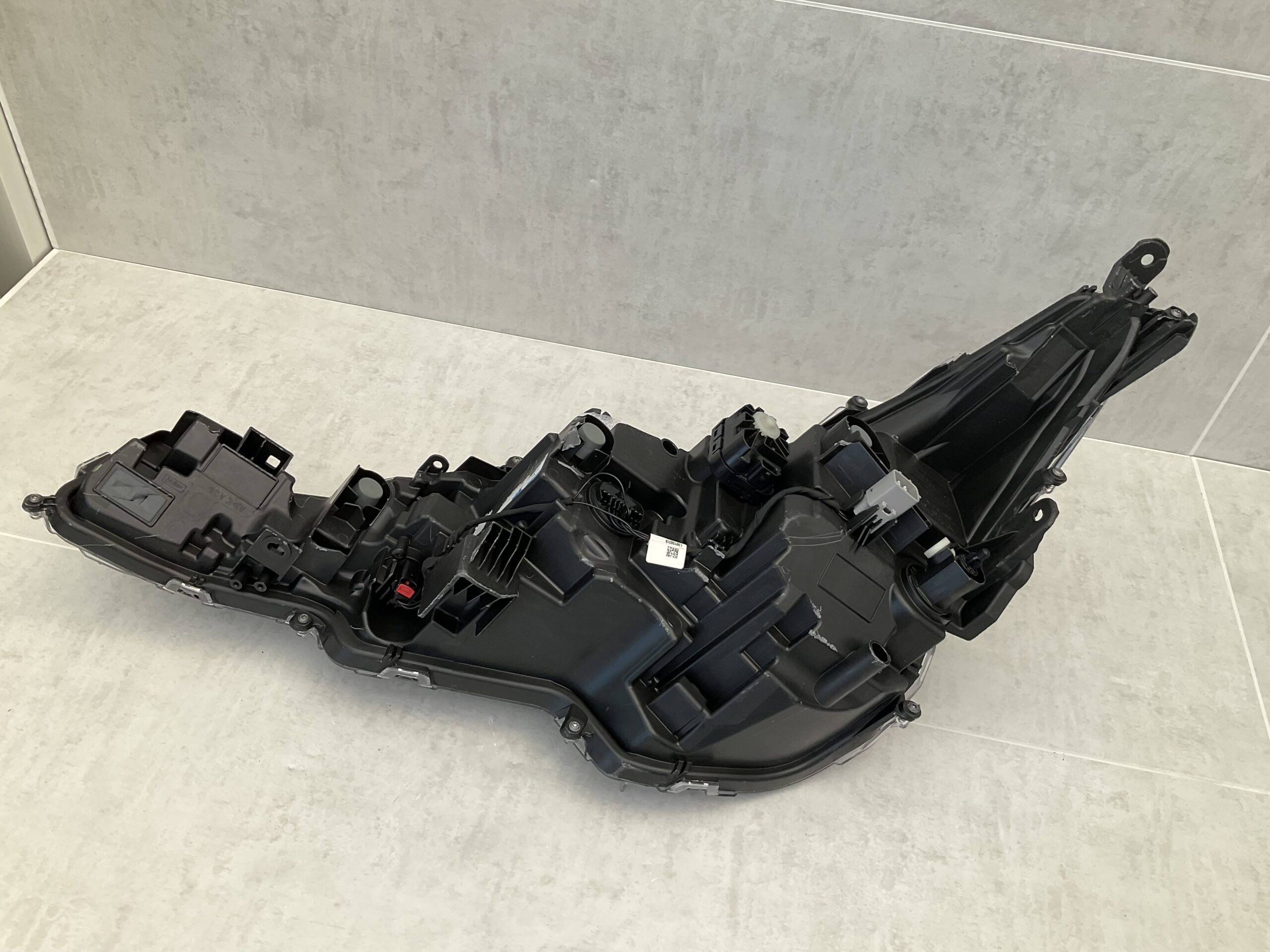 KOPLAMP TOYOTA COROLLA E21 L90119224 RECHTS TO-4827
